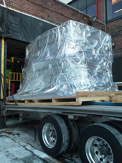 Equipment Being Moved Into A Warehousing Facility