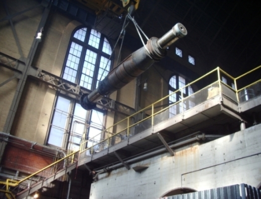 Picture of Large Shaft Being Rigged out of Power Plant
