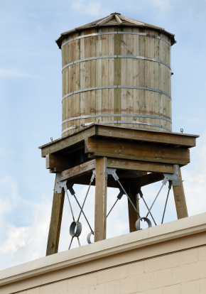 Wooden Rooftop Water Tanks: Familiar Fixtures of NYC Skyline