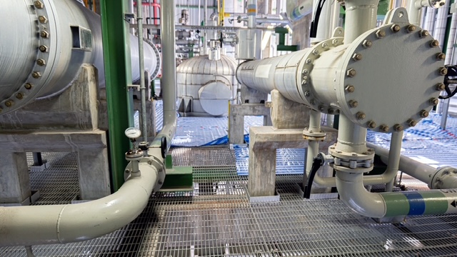 Several large steam-to-hot-water heat exchangers