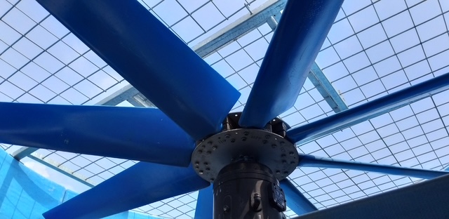 R. Baker & Son riggers setting water-cooled centrifugal chillers for data center cooling availability.